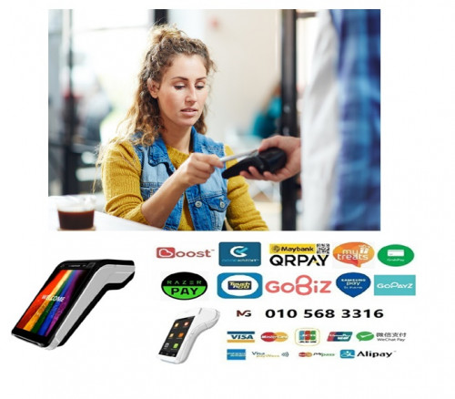 Positive attractive student girl using nfc on modern device while paying for cafe bill