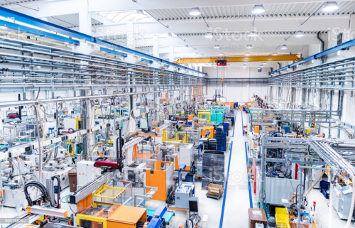 Horizontal color image of modern plastic factory.