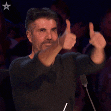 thumbs up simon cowell