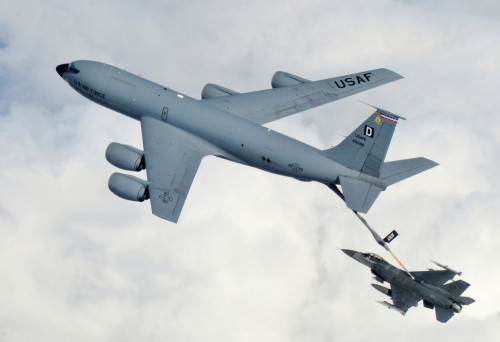 KC 135 refuels an F 16 Fighting Falcon